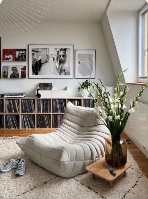 Cream Togo chair in Martin's attic living room with a record collection